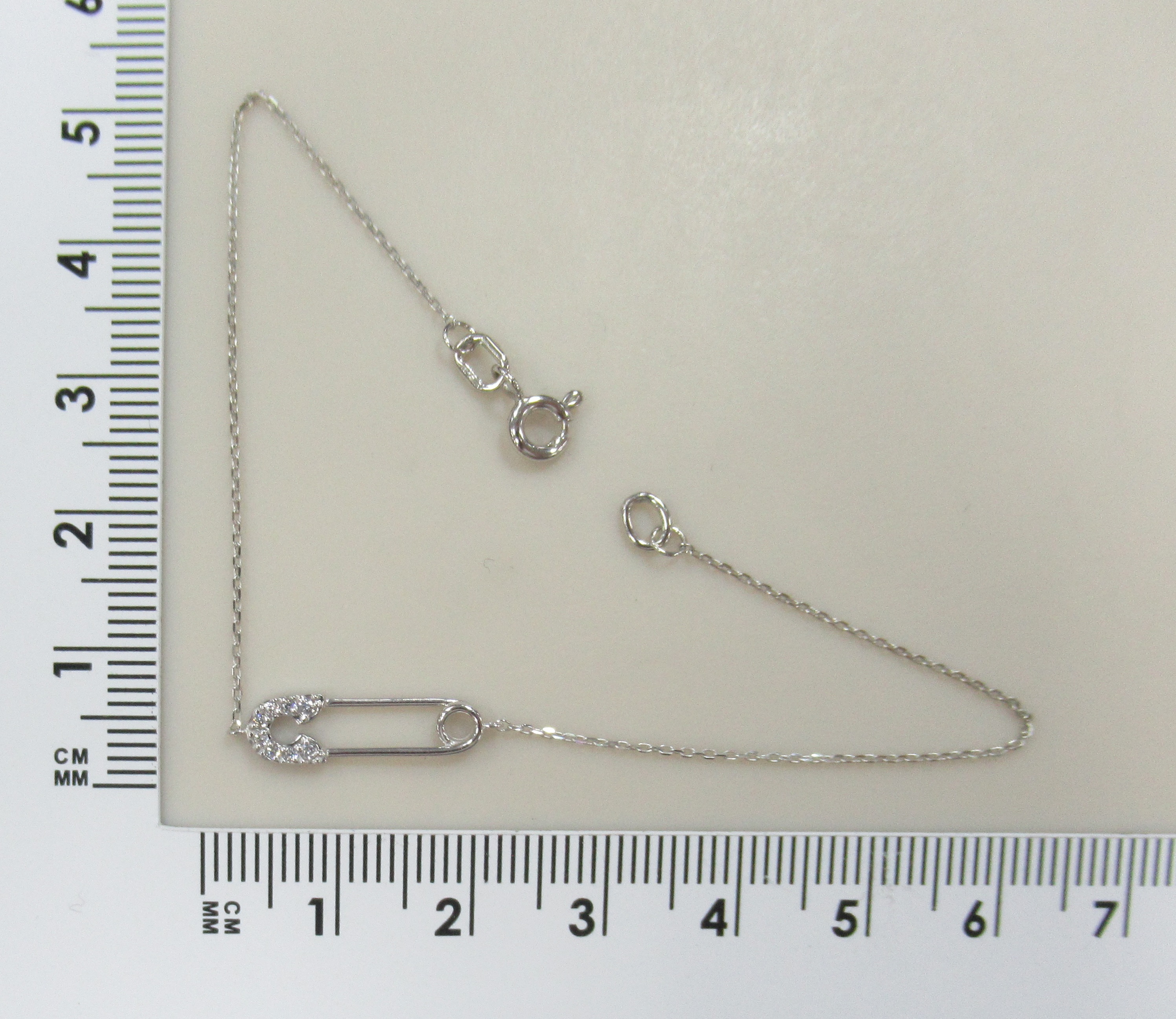 Золотой браслет 585 пробы; белое золото; родий; плетение Якорное; вставки 8 Фианит бесцв.;